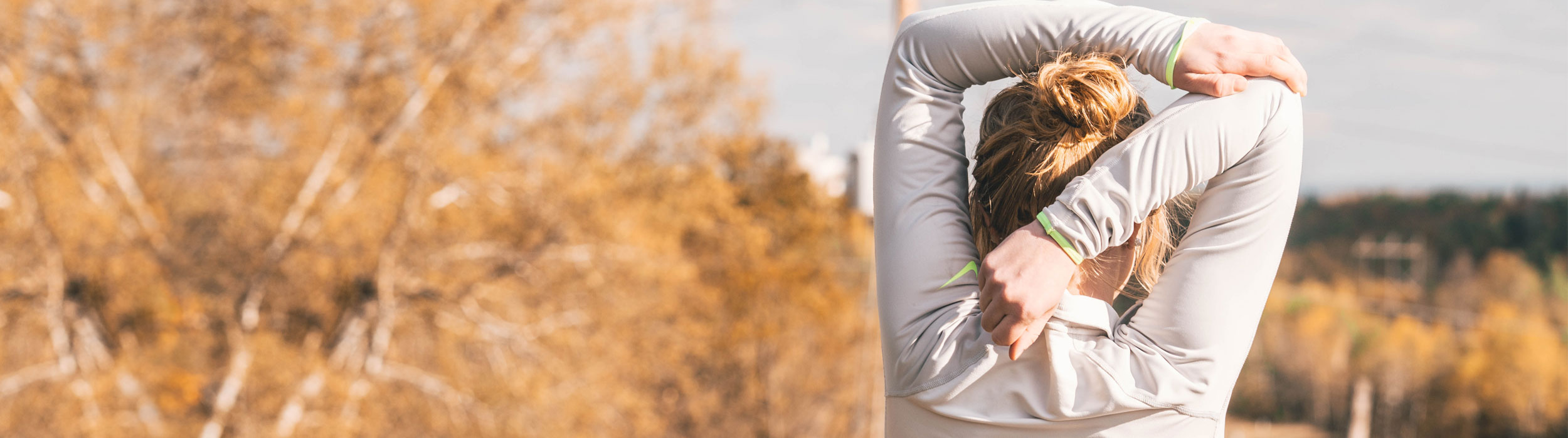 Woman stretching elbow